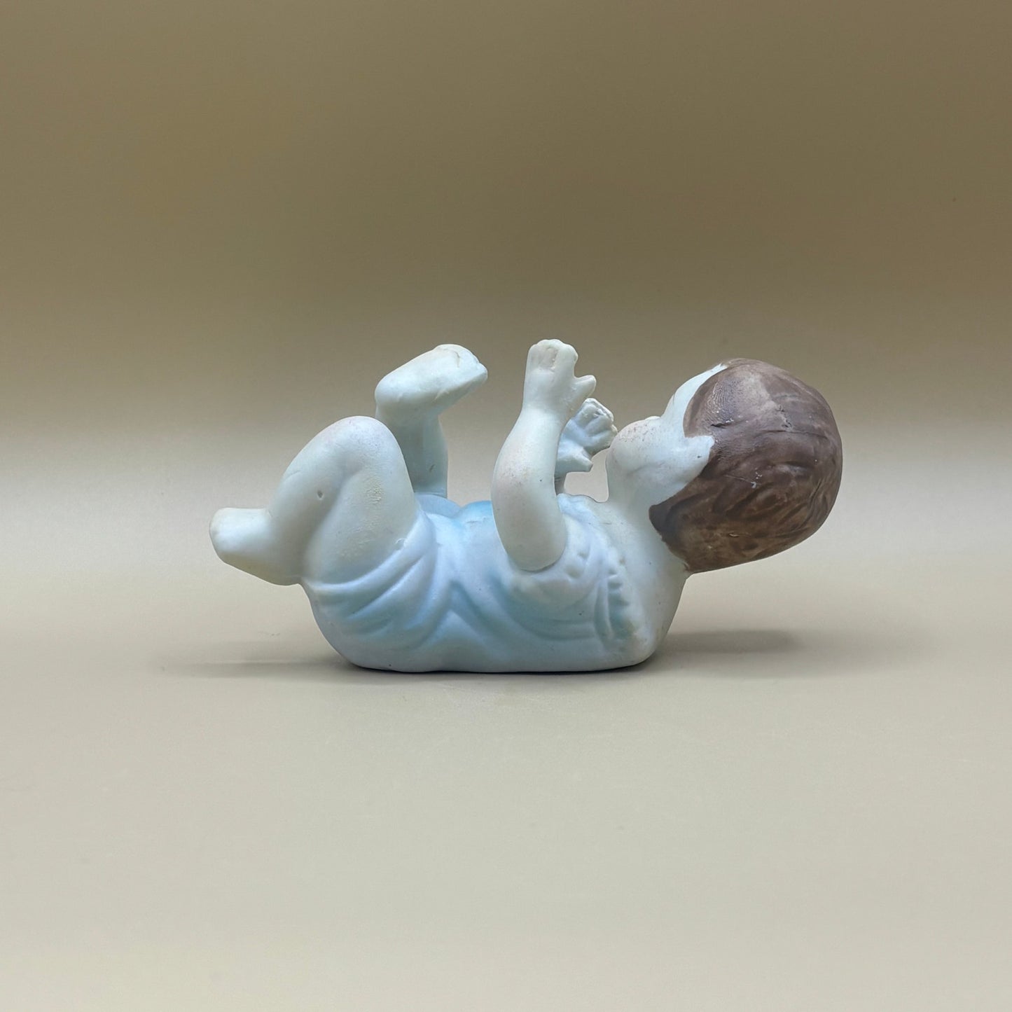 Pair of Porcelain Vintage Playing Baby Figurines