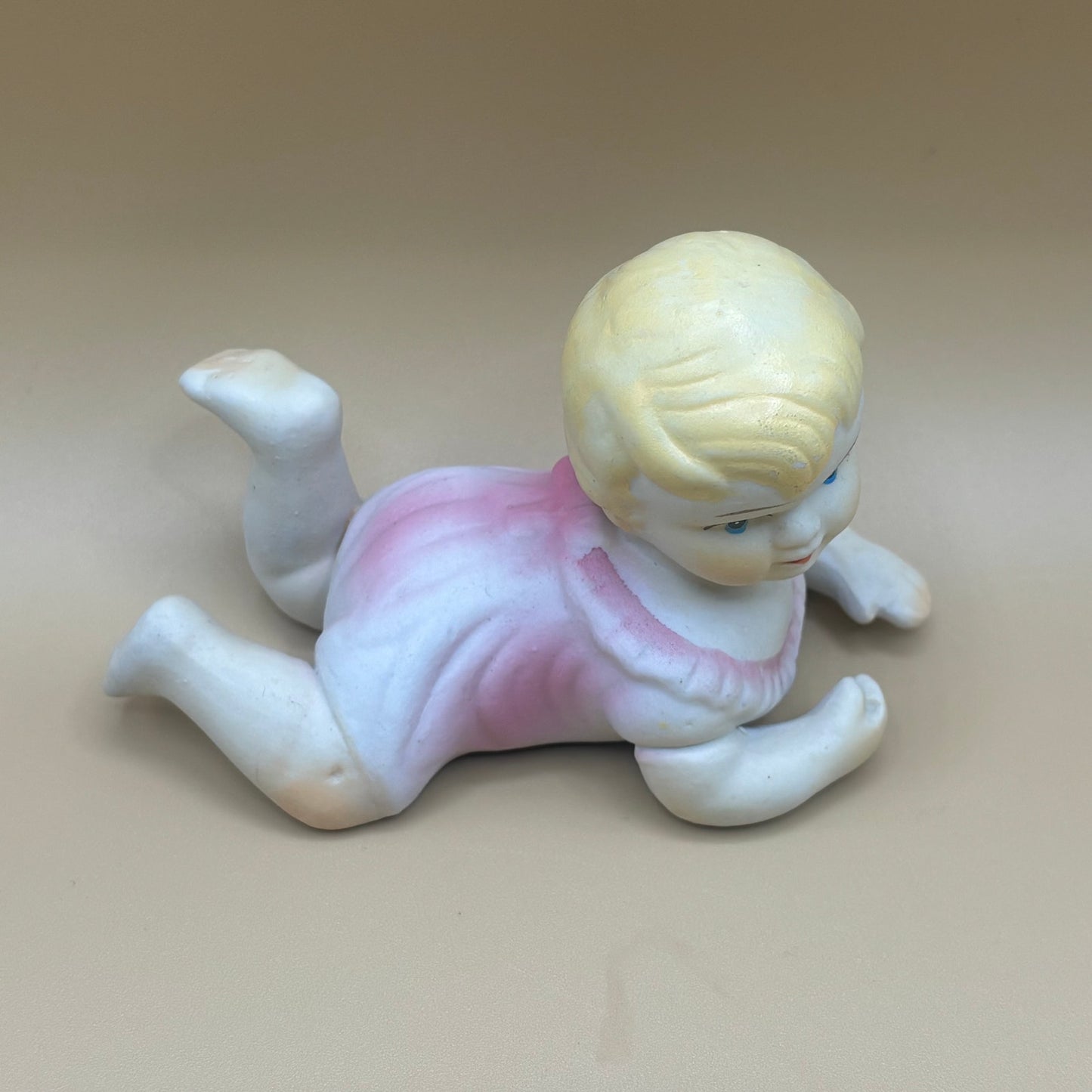 Pair of Porcelain Vintage Playing Baby Figurines