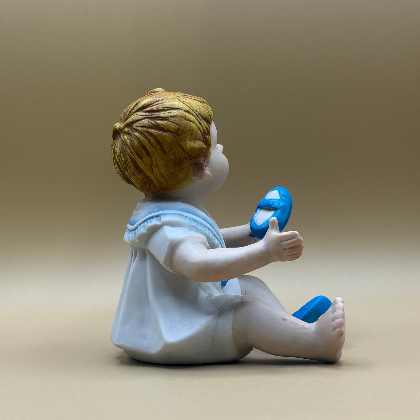 VTG Baby Boy Porcelain Figurine Putting His Shoes on 5.5"